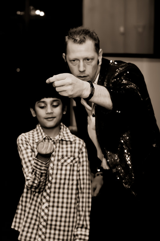 <img> Dallas / Fort Worth magician Kendal Kane magic shows for kids and having fun with magic shows for children and birthday party magician.